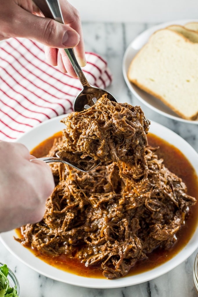 Slow-Cooked Pulled Brisket | www.oliviascuisine.com | Make this delicious pulled brisket in your crockpot and enjoy it in sandwiches, wraps or even in baked potatoes!