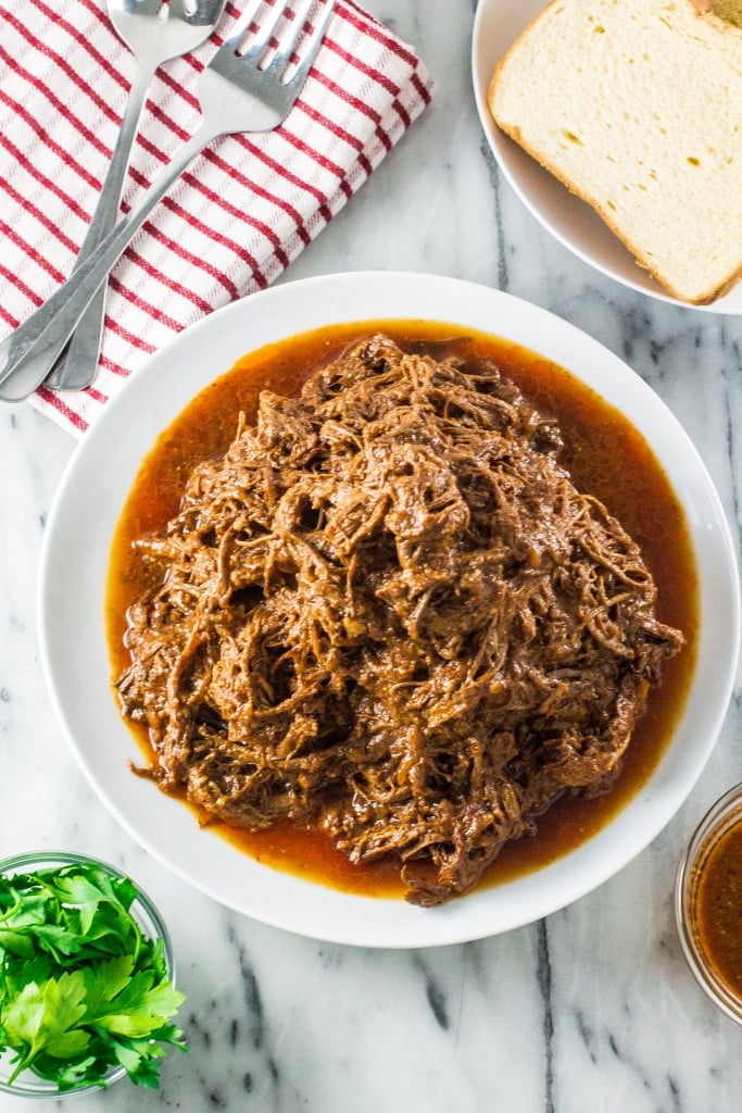 Slow-Cooked Pulled Brisket | www.oliviascuisine.com | Make this delicious pulled brisket in your crockpot and enjoy it in sandwiches, wraps or even in baked potatoes!