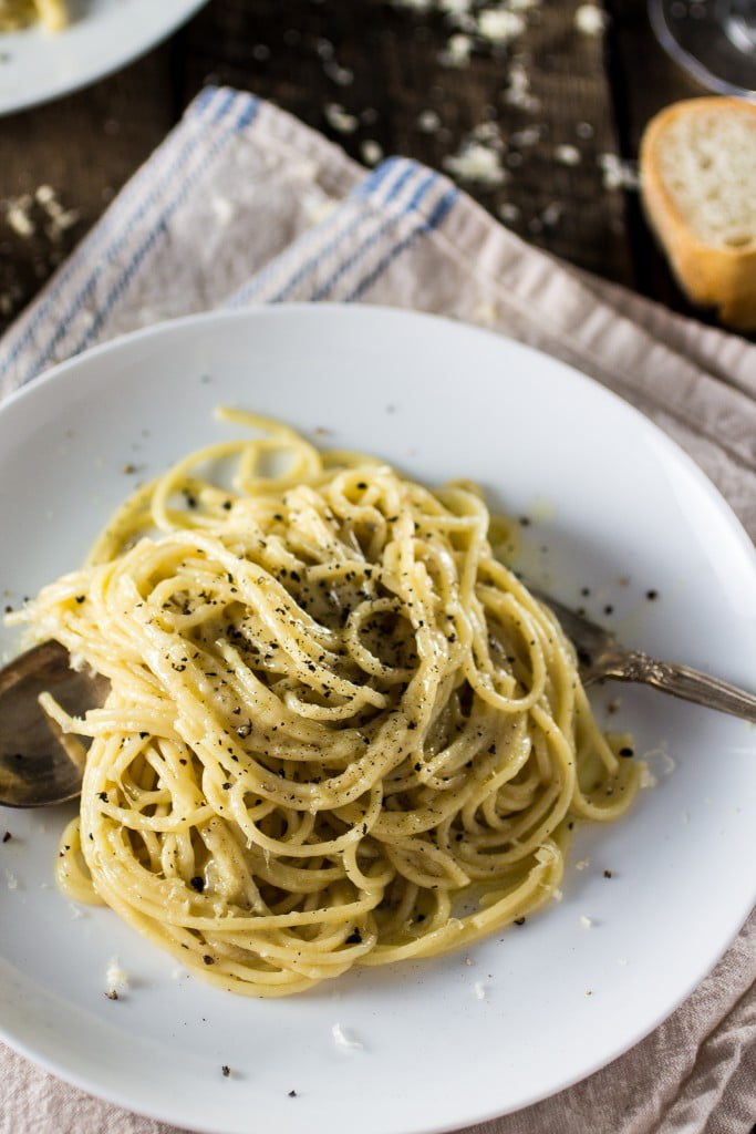 Spaghetti Cacio e Pepe | www.oliviascuisine.com | A traditional roman pasta dish made with Pecorino cheese, Parmigiano Reggiano, black pepper, spaghetti, butter, salt and pepper! And it's done in 20 minutes!