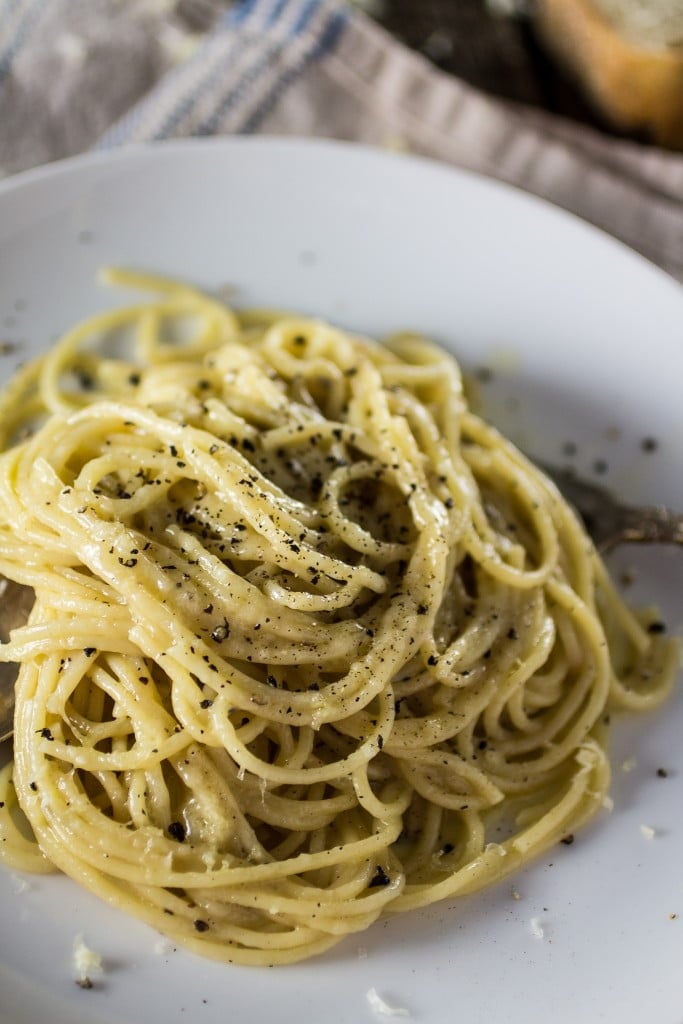 Spaghetti Cacio e Pepe | www.oliviascuisine.com | A traditional roman pasta dish made with Pecorino cheese, Parmigiano Reggiano, black pepper, spaghetti, butter, salt and pepper! And it's done in 20 minutes!