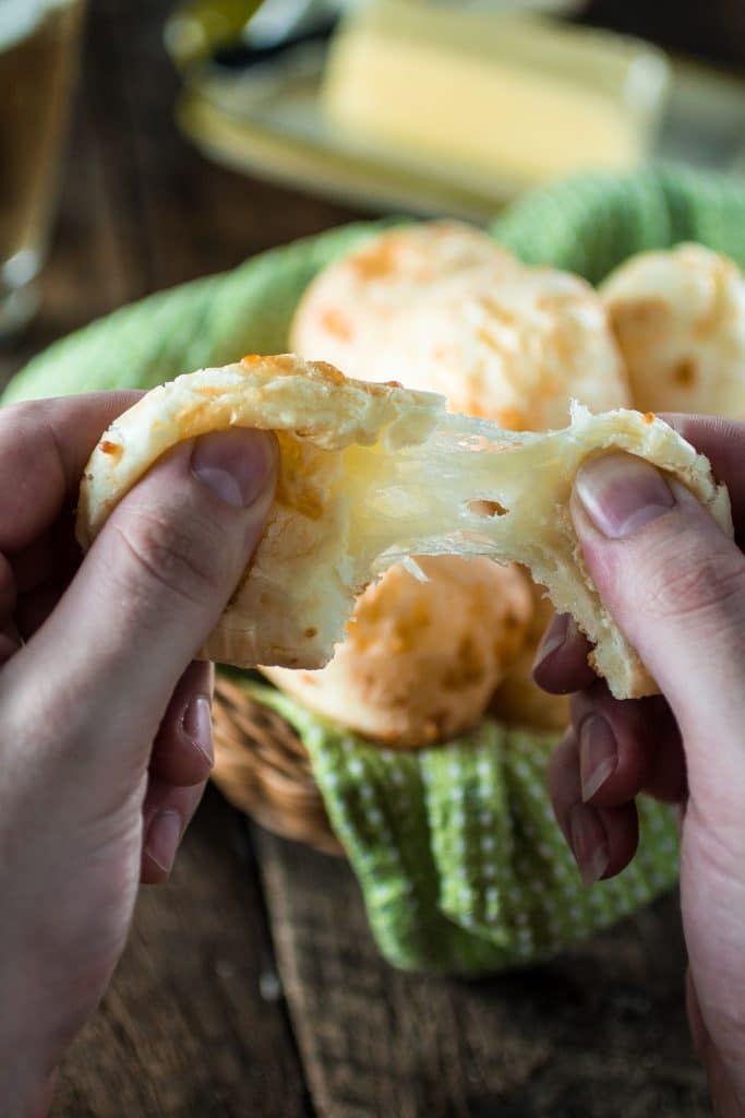 Authentic Brazilian Cheese Bread (Pão de Queijo) | www.oliviascuisine.com | The most popular Brazilian snack is gluten free and loaded with gooey cheese. You'll be hooked!