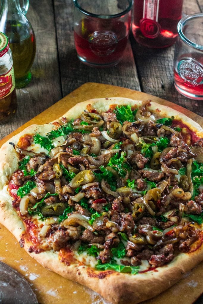 Italian Sausage Pizza with Caramelized Onions, Kale and Jalapeños | www.oliviascuisine.com