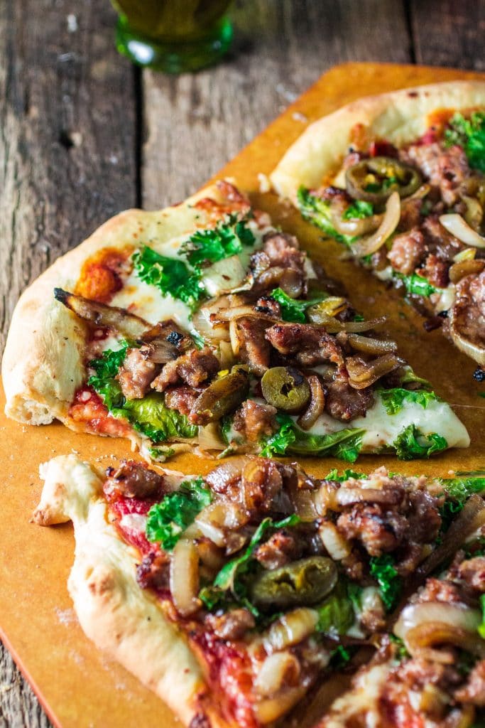Italian Sausage Pizza with Caramelized Onions, Kale and Jalapeños | www.oliviascuisine.com