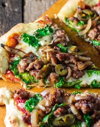 Italian Sausage Pizza with Caramelized Onions, Kale and Jalapeños