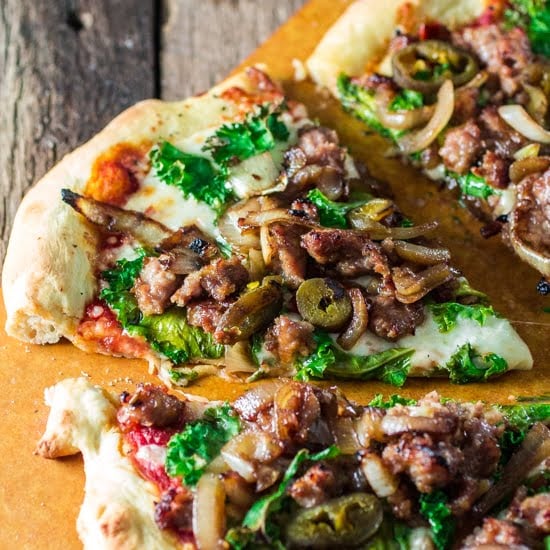 Italian Sausage Pizza with Caramelized Onions, Kale and Jalapeños