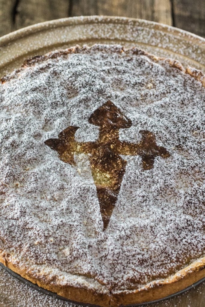 Torta de Santiago (Spanish Almond Pie) | www.oliviascuisine.com | Torta de Santiago (in Galician) or Tarta de Santiago (in Spanish) is a popular almond pie served in Santiago de Compostela. It is usually marked with the cross of the Order of Santiago.