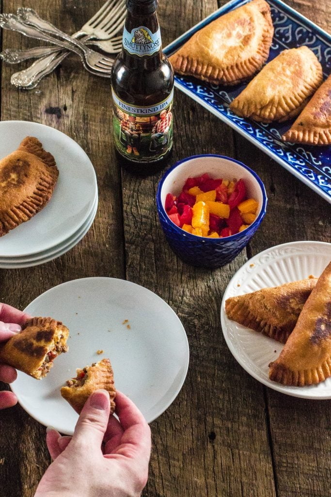 Argentinian Beef Empanadas | www.oliviascuisine.com | Delicious Argentinian Empanadas filled with ground beef, onions, garlic, tomatoes, peppers, olives and seasoned with paprika and cumin!