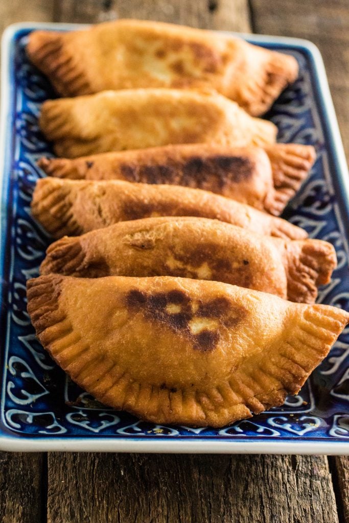 Argentinian Beef Empanadas | www.oliviascuisine.com | Delicious Argentinian Empanadas filled with ground beef, onions, garlic, tomatoes, peppers, olives and seasoned with paprika and cumin!