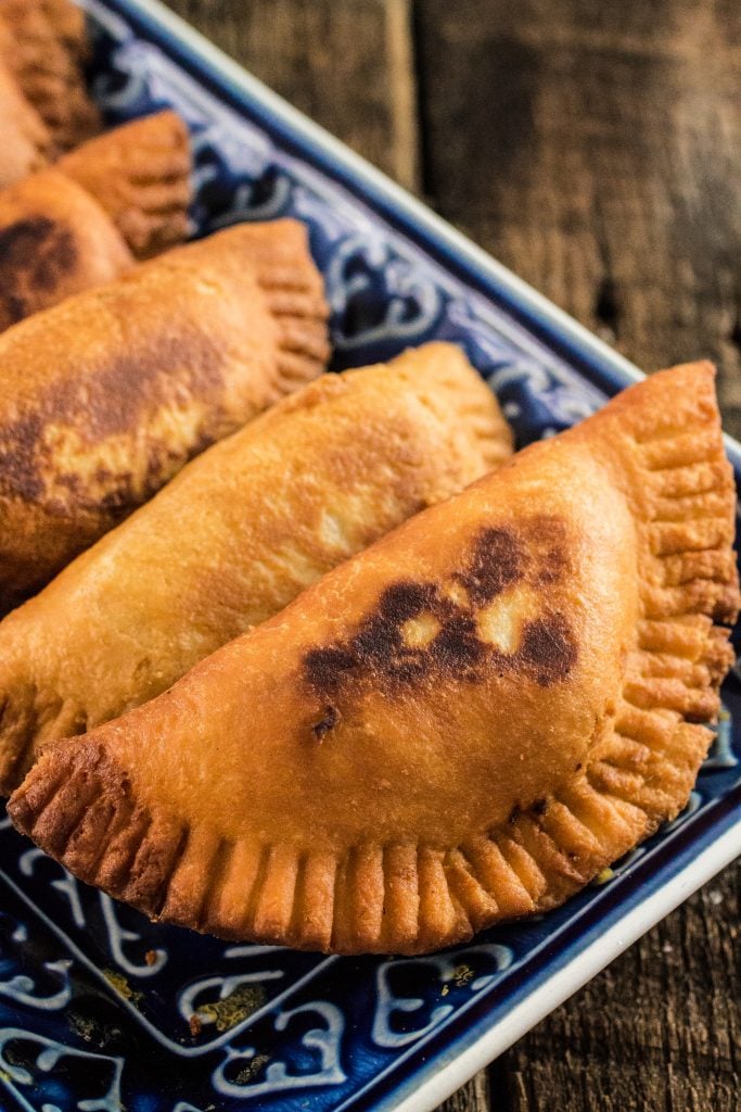 Argentinian Beef Empanadas | www.oliviascuisine.com | Delicious Argentinian Empanadas filled with ground beef, onions, garlic, tomatoes, peppers, olives and seasoned with paprika and cumin!