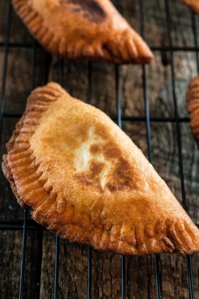 Argentinian Beef Empanadas | www.oliviascuisine.com | Delicious Argentinian Empanadas filled with ground beef, onions, garlic, tomatoes, peppers, olives and seasoned with paprika and cumin!