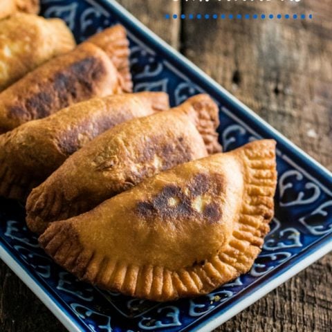 Argentinian Beef Empanadas | www.oliviascuisine.com | Delicious Argentinian Empanadas filled with ground beef, onions, garlic, tomatoes, peppers, olives and seasoned with paprika and cumin!