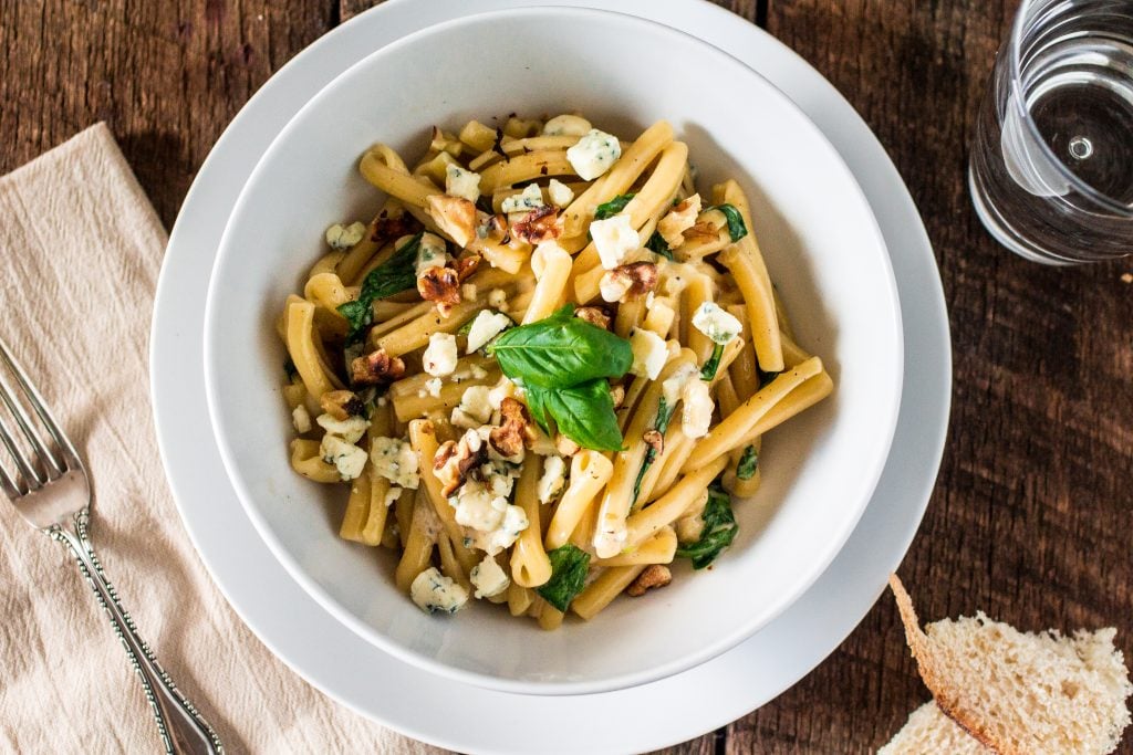 Casarecce Siciliane with Gorgonzola, Walnuts, Arugula and a touch of cream | www.oliviascuisine.com | This Italian dish is easy, hearty and perfect either for busy weeknights or leisurely  dinner parties!