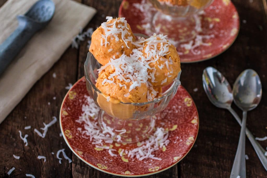 Pumpkin Coconut Ice Cream | www.oliviascuisine.com | Excited for Fall but can't let go of summer? This recipe brings at the best of both worlds!