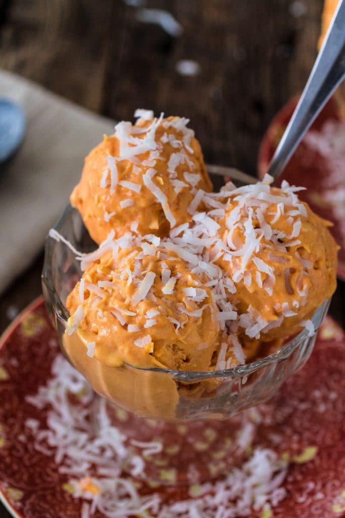 Pumpkin Coconut Ice Cream | www.oliviascuisine.com | Excited for Fall but can't let go of summer? This recipe brings at the best of both worlds!