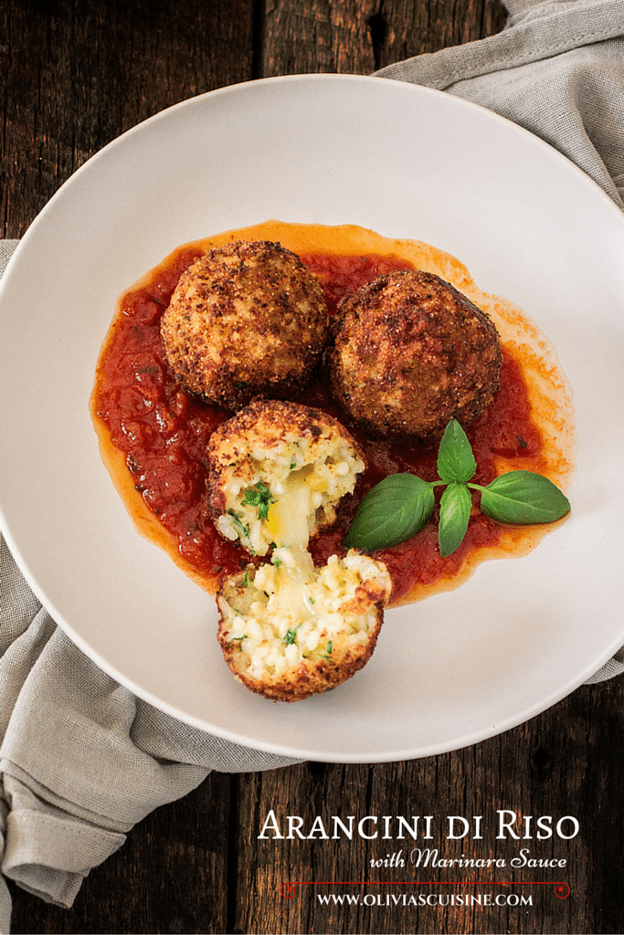 Arancini Di Riso with Balsamic Vinegar and Caramelized Onions Marinara Sauce | www.oliviascuisine.com | These risotto balls stuffed with cheese are an easy and delicious Italian antipasto! The recipe includes a basic parmesan risotto recipe, but you can absolutely use leftover risotto.