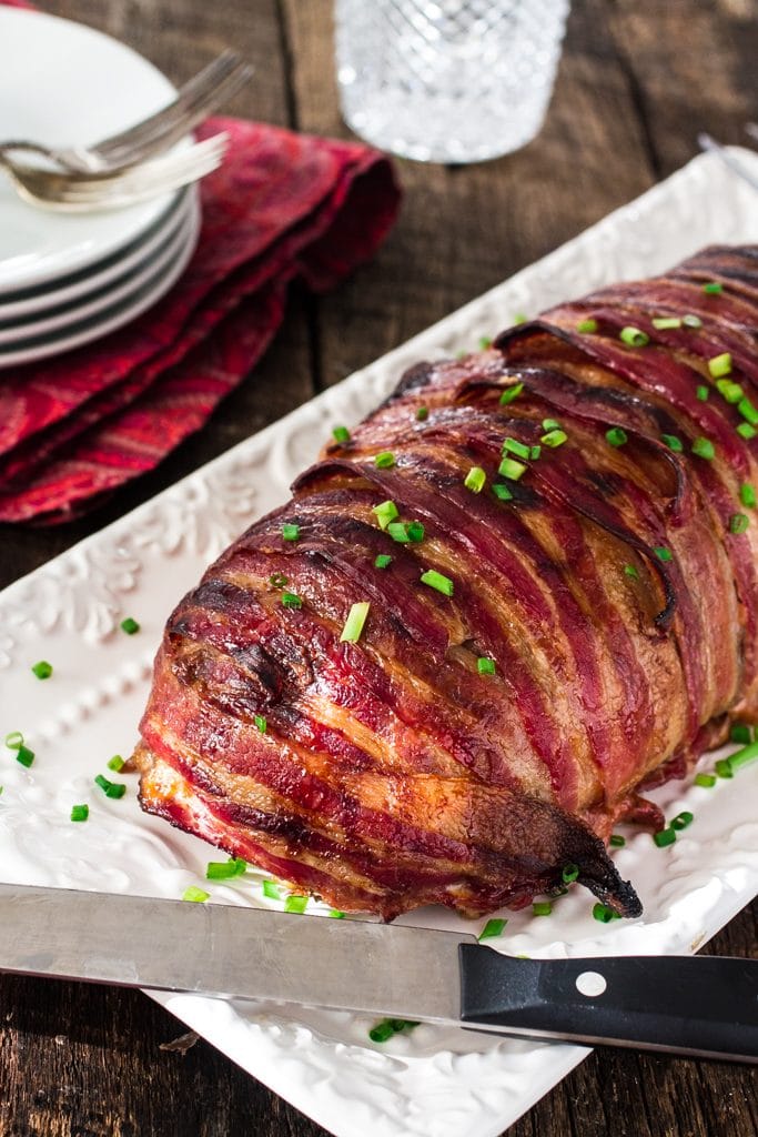 Bacon Wrapped Cheese Stuffed Meatloaf | www.oliviascuisine.com | Forget tough, dry meatloaves! This Bacon Wrapped Cheese Stuffed Meatloaf is not only moist but SO FLAVORFUL! Comfort food at its best! #NaturallyCheesy #AD