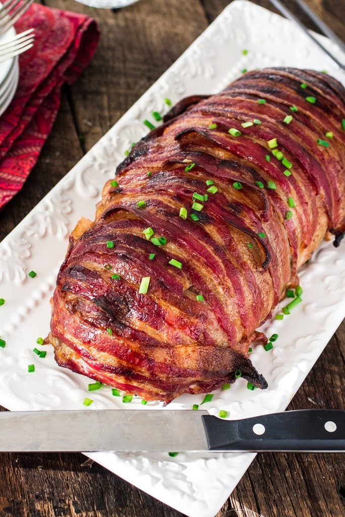 Bacon Wrapped Cheese Stuffed Meatloaf | www.oliviascuisine.com | Forget tough, dry meatloaves! This Bacon Wrapped Cheese Stuffed Meatloaf is not only moist but SO FLAVORFUL! Comfort food at its best! #NaturallyCheesy #AD