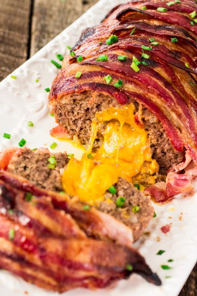 Bacon Wrapped Cheese Stuffed Meatloaf | www.oliviascuisine.com | Forget tough, dry meatloaves! This Bacon Wrapped Cheese Stuffed Meatloaf is not only moist but SO FLAVORFUL! Comfort food at its best! #NaturallyCheesy #AD