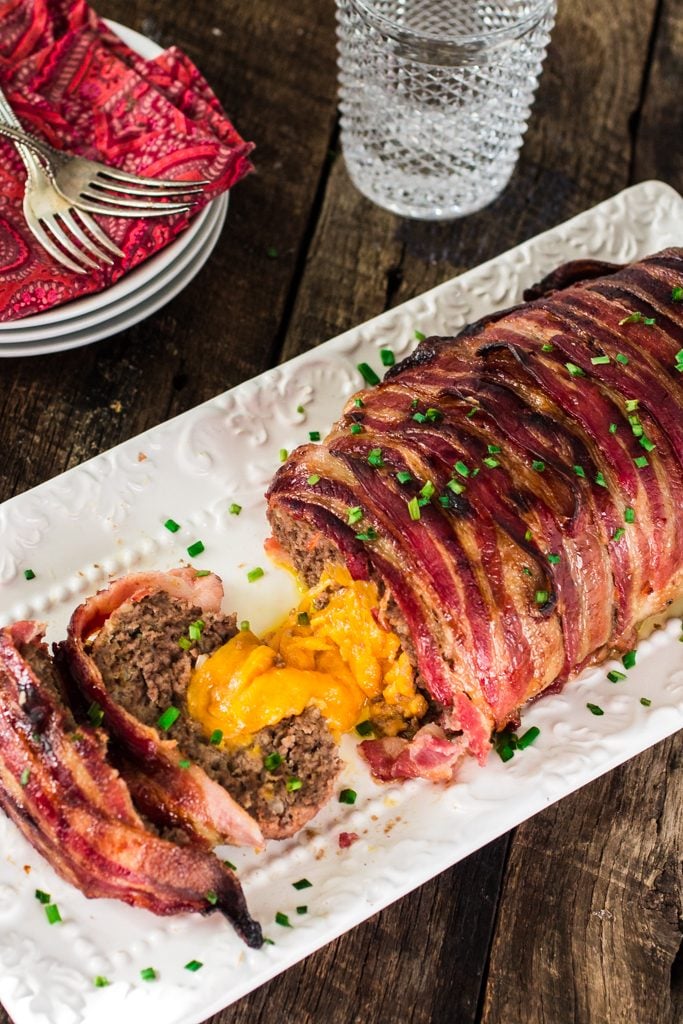 Bacon Wrapped Cheese Stuffed Meatloaf | www.oliviascuisine.com | Forget tough, dry meatloaves! This Bacon Wrapped Cheese Stuffed Meatloaf is not only moist but SO FLAVORFUL! Comfort food at its best! #NaturallyCheesy #AD