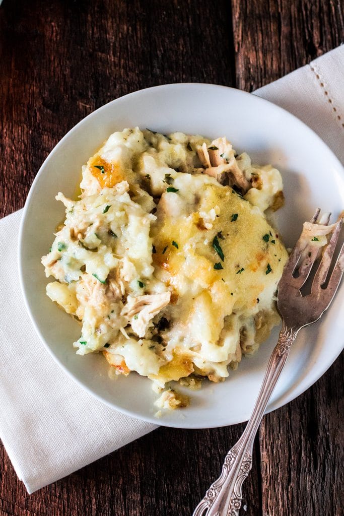 Turkey and Mashed Potatoes Casserole | www.oliviascuisine.com | Looking for a good recipe to use all those Thanksgiving leftovers? Look no further! This casserole is made with leftover turkey, gravy and mashed potatoes (plus some parmesan cheese, obviously! :P) and is to die for!