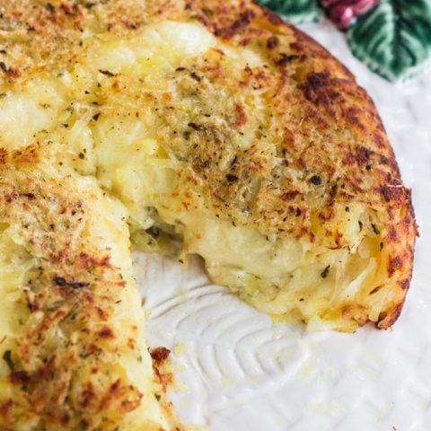 Three-Cheese Stuffed Rosti Potatoes | www.oliviascuisine.com | This delicious dish comes from Switzerland and consists of a potato cake, fried on both sides and stuffed with 3 different types of cheese. Perfect as a side dish for the holidays or as a main course whenever you are craving potatoes. #BeholdPotatoes #sponsored
