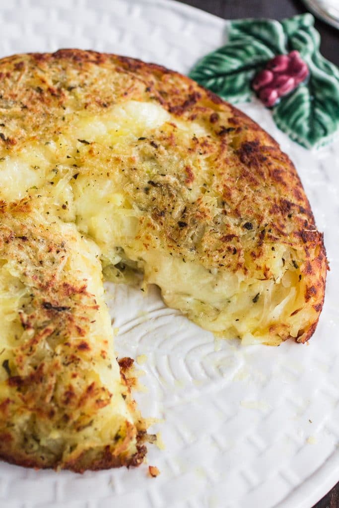 Three-Cheese Stuffed Rosti Potatoes | www.oliviascuisine.com | This delicious dish comes from Switzerland and consists of a potato cake, fried on both sides and stuffed with 3 different types of cheese. Perfect as a side dish for the holidays or as a main course whenever you are craving potatoes. #BeholdPotatoes #sponsored