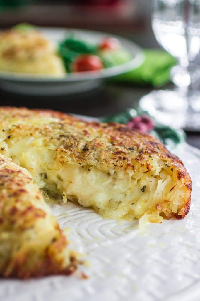 Three-Cheese Stuffed Rosti Potatoes | www.oliviascuisine.com | This delicious dish comes from Switzerland and consists of a potato cake, fried on both sides and stuffed with 3 different types of cheese. Perfect as a side dish for the holidays or as a main course whenever you are craving potatoes. #BeholdPotatoes #sponsored