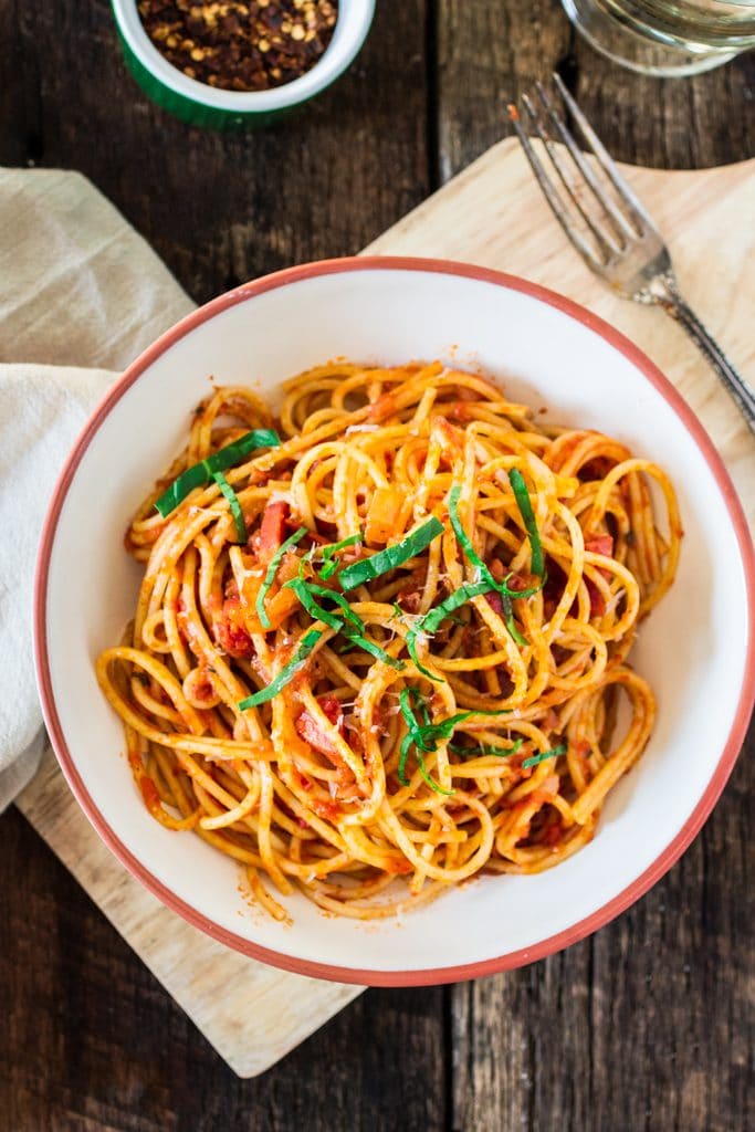 Spaghetti all' Amatriciana | www.oliviascuisine.com | A super easy yet delicious spicy pasta dish featuring diced pancetta, red pepper flakes, basil and Bertolli Riserva Marinara with Parmigiano-Reggiano. #sponsored
