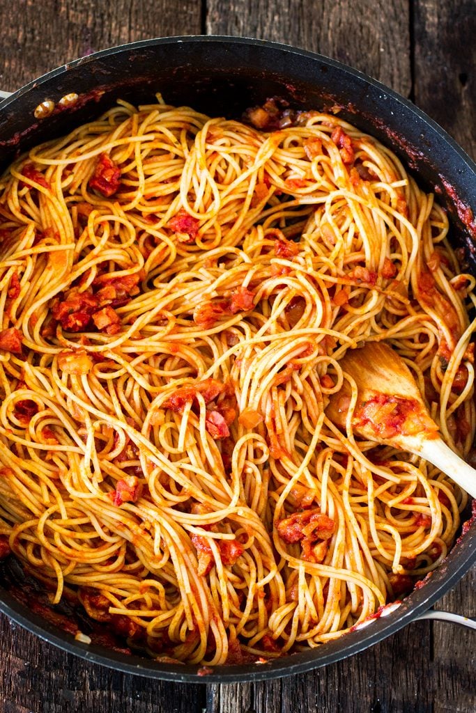 Spaghetti all' Amatriciana | www.oliviascuisine.com | A super easy yet delicious spicy pasta dish featuring diced pancetta, red pepper flakes, basil and Bertolli Riserva Marinara with Parmigiano-Reggiano. #sponsored