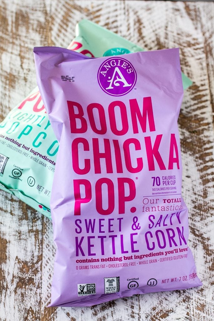 Popcorn Party Mix | www.oliviascuisine.com | Making a popcorn party mix couldn't be easier. Simply toss together some BOOMCHICKAPOP, chocolate covered pretzels and roasted almonds. Oh, and don't forget to drizzle everything with some melted peanut butter! :P #sponsored #BringtheBOOM