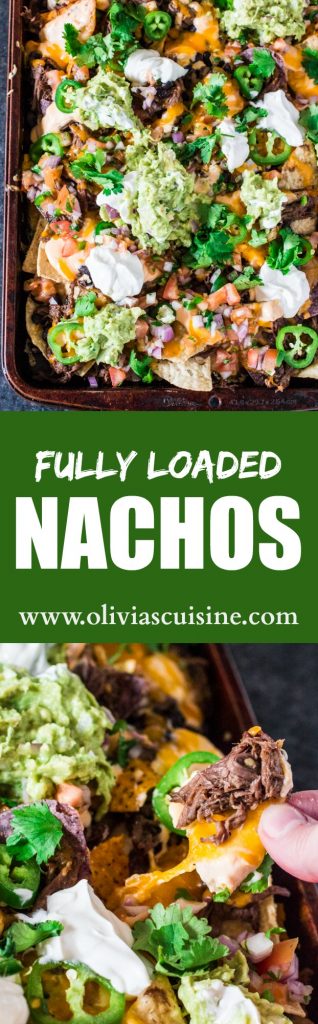 Fully Loaded Nachos | www.oliviascuisine.com | 9 layers of perfection: 3 different kinds of tortilla chips, Chipotle Beer Shredded Beef, Black Beans, the most incredible cheese sauce, more cheese, pico de gallo salsa, jalapeños, guacamole and sour cream or mexican crema!