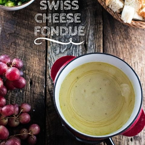 Swiss Cheese Fondue | www.oliviascuisine.com | Take date night to a whole new level with this classic Swiss Cheese Fondue. Because nothing says romance like sharing a pot of melted cheese!