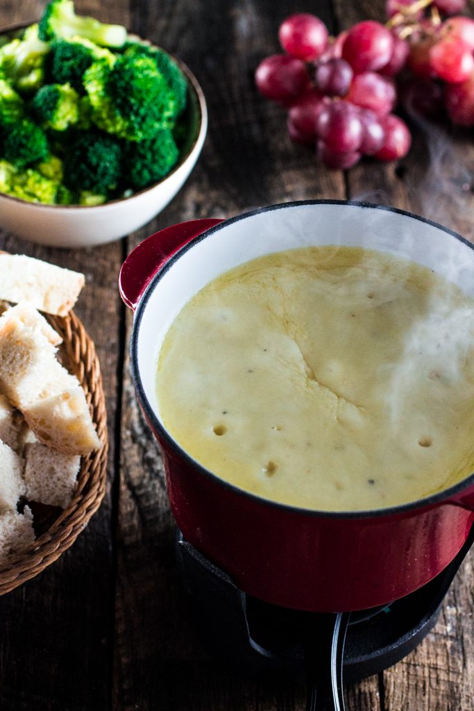 Swiss Cheese Fondue | www.oliviascuisine.com | Take date night to a whole new level with this classic Swiss Cheese Fondue. Because nothing says romance like sharing a pot of melted cheese!