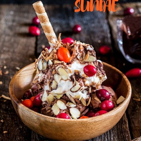 Mexican Hot Fudge Sundae | www.oliviascuisine.com | Chocolate ice cream topped with a delicious spiced hot fudge, whipped cream, toasted coconut flakes, almonds and M&M’s® Chili Nut! #MMSFlavorVote #Walmart #ad