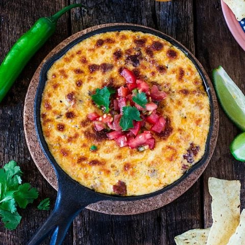 Mexican Queso Fundido with Chorizo | www.oliviascuisine.com | Celebrate Cinco de Mayo with this cheesy and delicious appetizer. You can omit the chorizo for a vegetarian version!