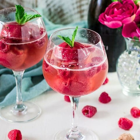 Raspberry Sorbet Bellini | www.oliviascuisine.com | A fun twist on the classic Bellini, made with raspberry sorbet and prosecco. Perfect for Spring and Summer! #VOVETI #CleverGirls