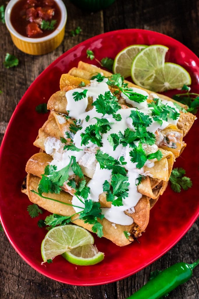 Creamy Chicken Taquitos with Salsa Roja | www.oliviascuisine.com | These chicken taquitos - or flautas, in Spanish - are seriously to die for! Crunchy, creamy and bursting with shredded chicken! The kids will definitely love it ! #sp #DiaDelNino #HerdezKids