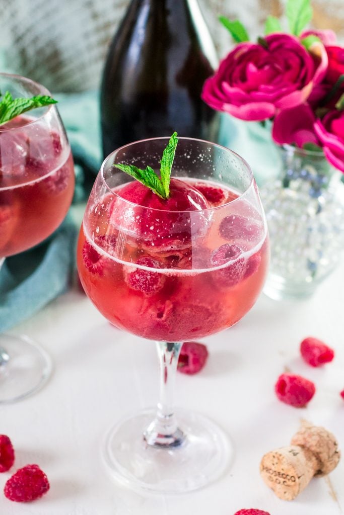 Raspberry Sorbet Bellini | www.oliviascuisine.com | A fun twist on the classic Bellini, made with raspberry sorbet and prosecco. Perfect for Spring and Summer! #VOVETI #CleverGirls