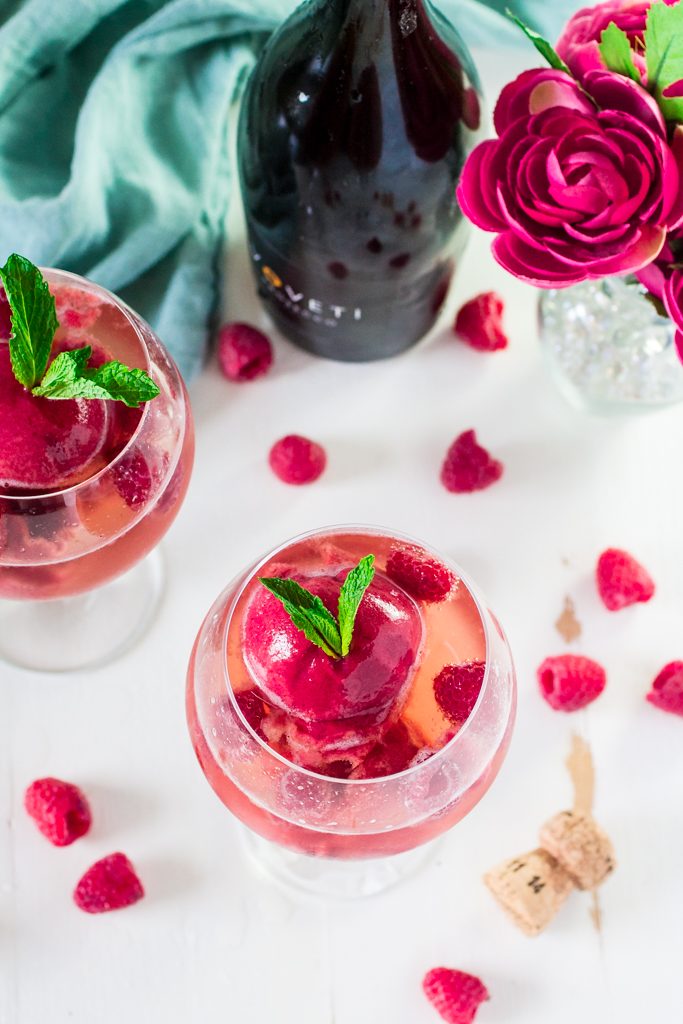 Raspberry Sorbet Bellini | www.oliviascuisine.com | A fun twist on the classic Bellini, made with raspberry sorbet and prosecco. Perfect for Spring and Summer! #VOVETI #CleverGirls