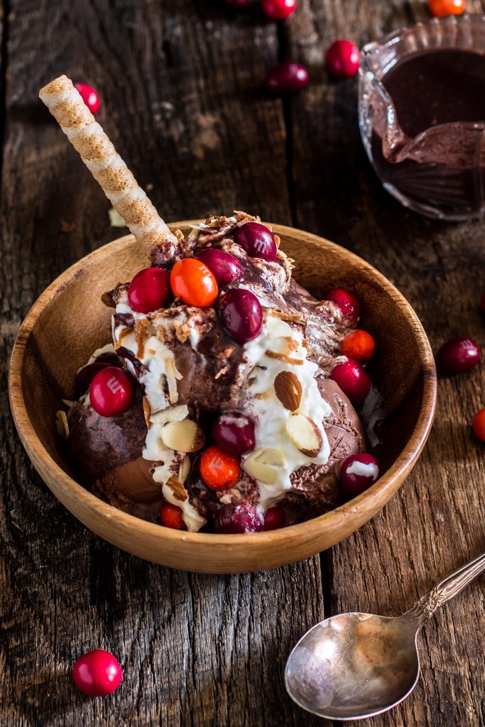 Mexican Hot Fudge Sundae | www.oliviascuisine.com | Chocolate ice cream topped with a delicious spiced hot fudge, whipped cream, toasted coconut flakes, almonds and M&M’s® Chili Nut! #MMSFlavorVote #Walmart #ad