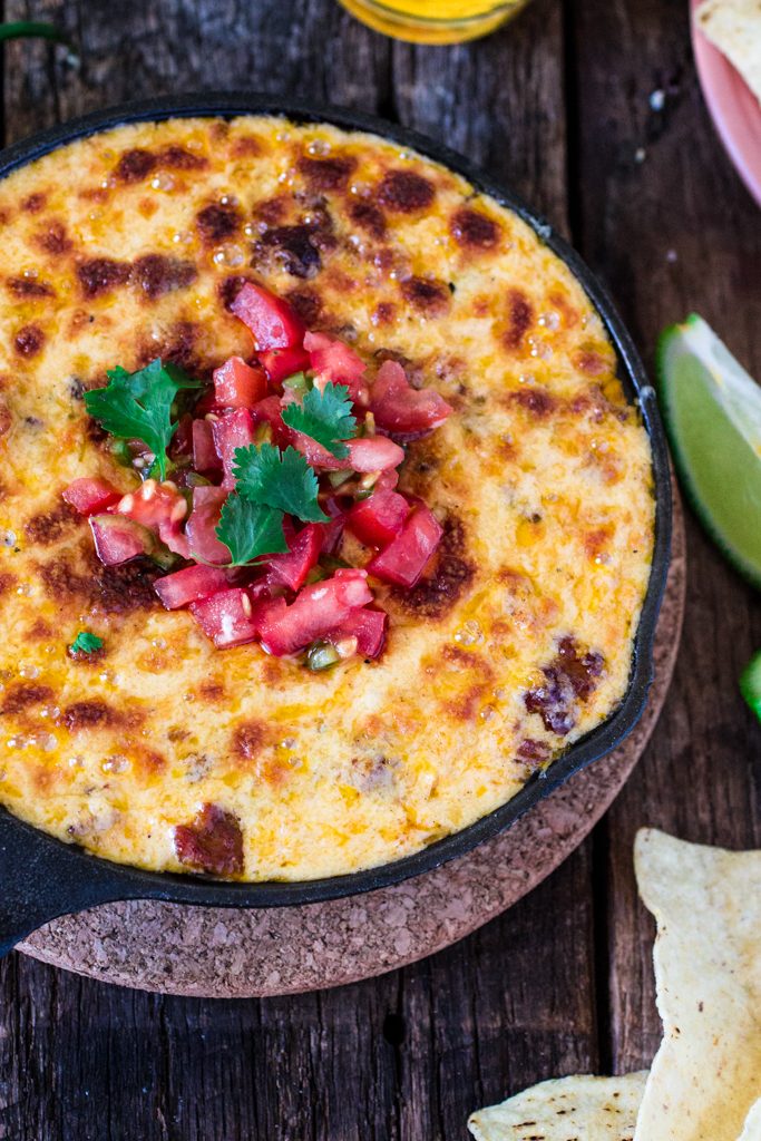 Mexican Queso Fundido with Chorizo | www.oliviascuisine.com | Celebrate Cinco de Mayo with this cheesy and delicious appetizer. You can omit the chorizo for a vegetarian version!