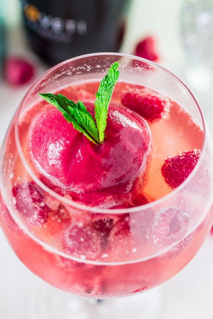 Raspberry Sorbet Bellini | www.oliviascuisine.com | A fun twist on the classic Bellini, made with raspberry sorbet and prosecco. Perfect for Spring and Summer! #VOVETI #CleverGirls