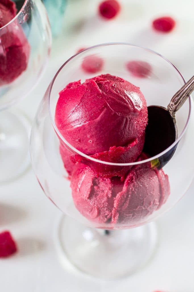 Raspberry Sorbet Bellini | www.oliviascuisine.com | A fun twist on the classic Bellini, made with raspberry sorbet and prosecco. Perfect for Spring and Summer! #VOVETI #CleverGirls