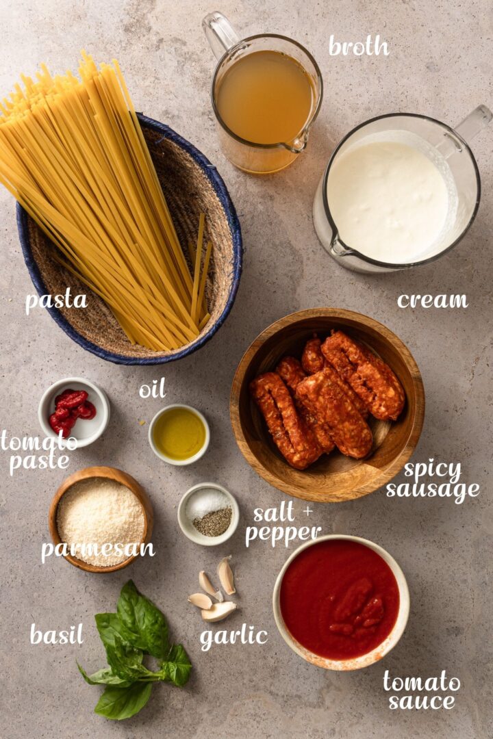 Ingredients needed to make creamy one pot pasta with spicy sausage