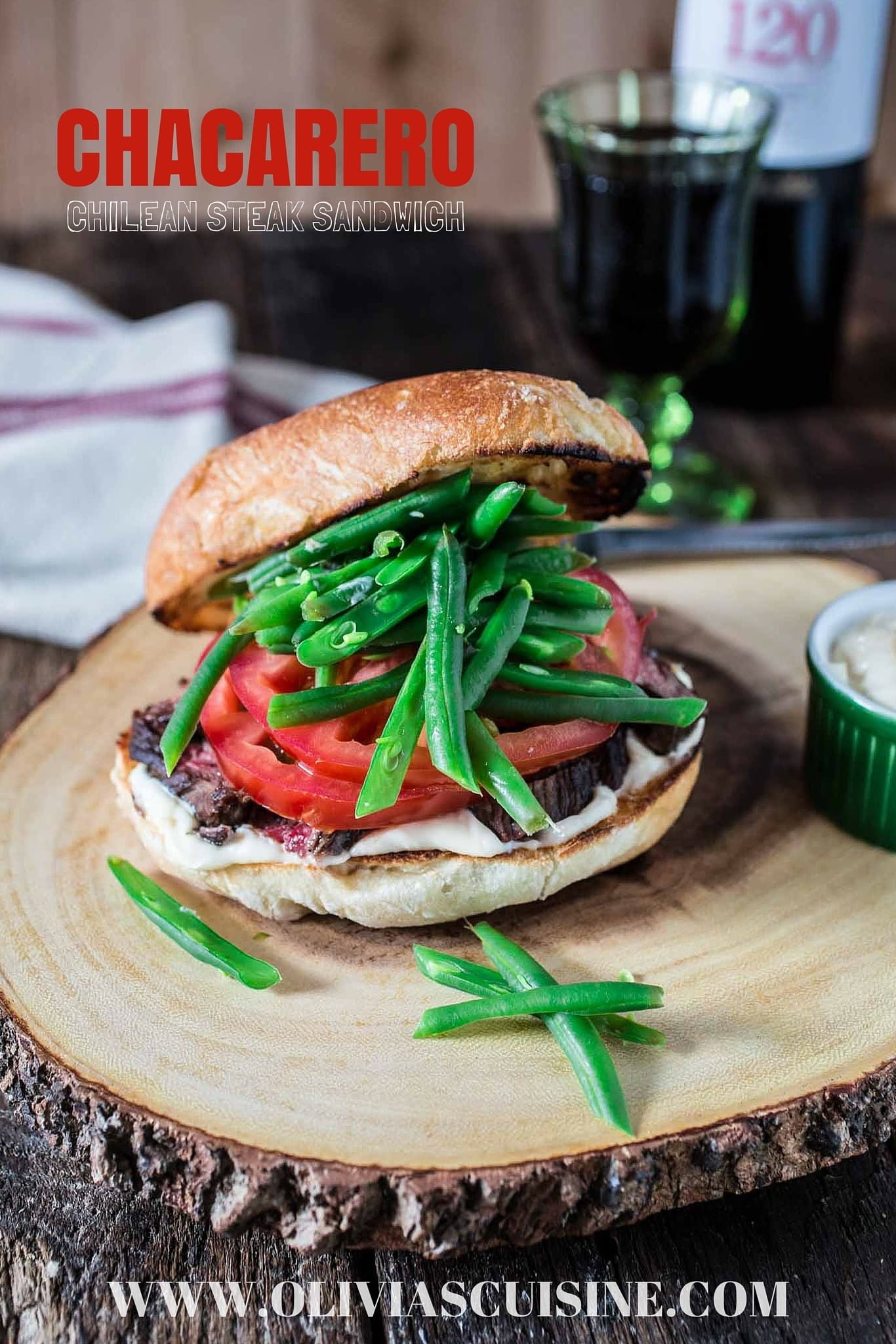 Chacarero (Chilean Steak Sandwich) | www.oliviascuisine.com | This is Chile's national sandwich. It consists of a roll piled high with grilled meat, tomatoes, a dollop of mayo, hot sauce and green beans! (Food styling and photography by Olivia Mesquita.) 