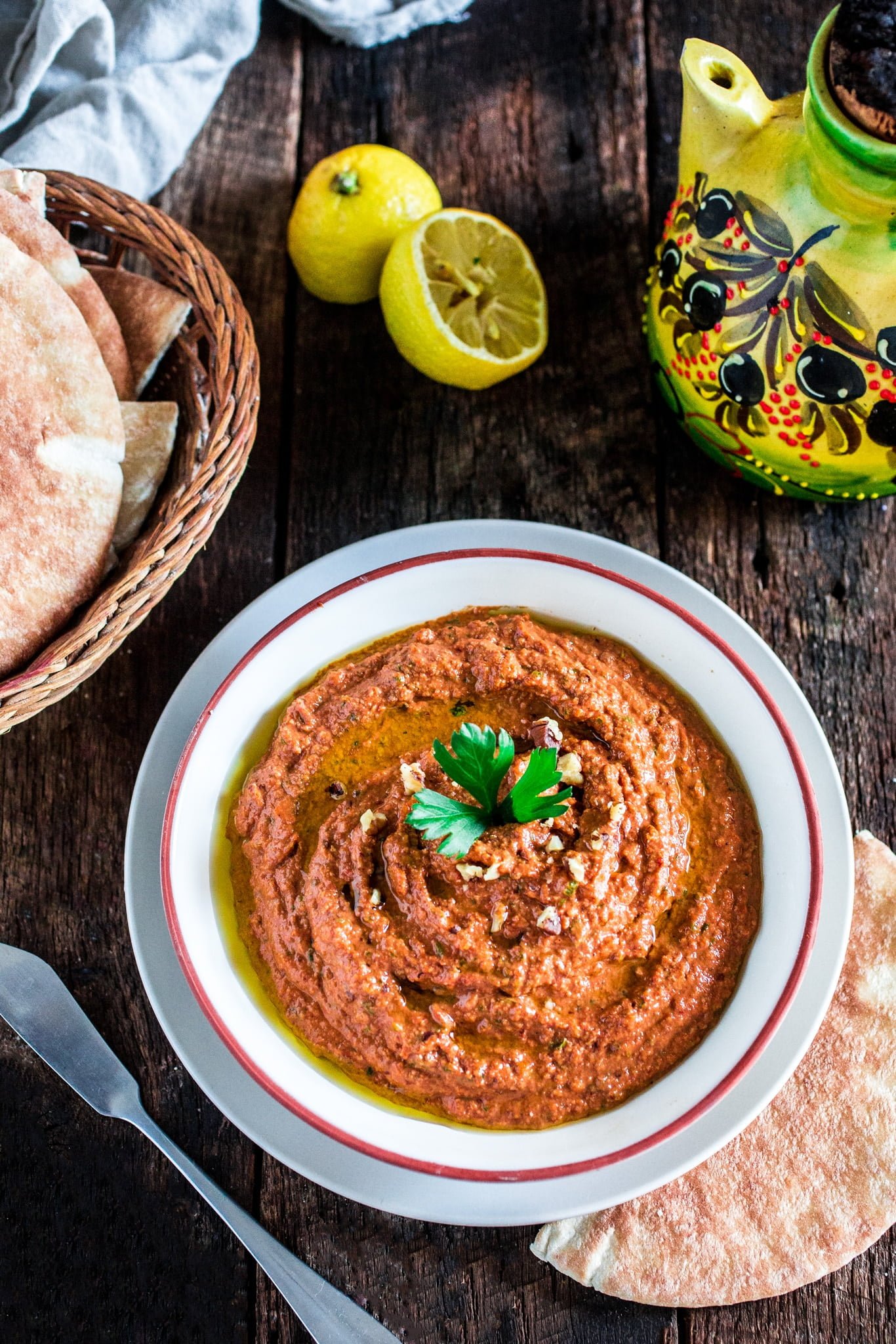 Muhammara (Red Pepper and Walnut Dip) | www.oliviascuisine.com | A middle eastern spread made with roasted red peppers, toasted walnuts, scallions, spices, breadcrumbs, olive oil and pomegranate molasses. It's a delicious sweet and spicy dip and a great alternative to hummus! (In partnership with Mezzetta.)