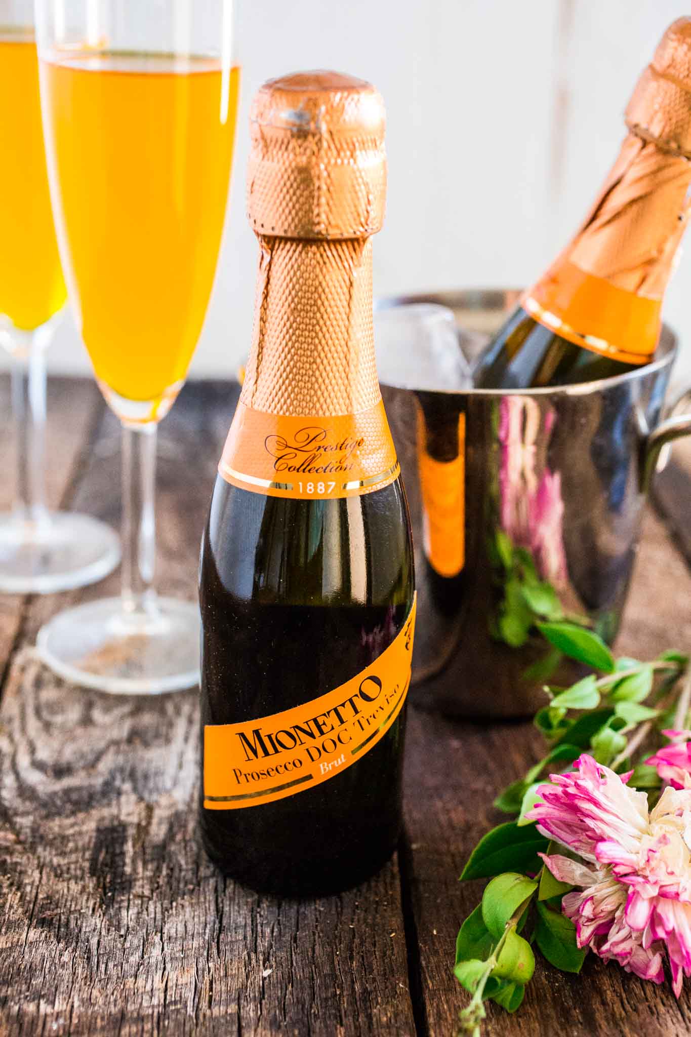 Passion Fruit Prosecco Mimosa | www.oliviascuisine.com | A refreshing and easy cocktail, made with only 2 ingredients: Passion Fruit juice and Mionetto Prosecco! MyMionetto (Msg 4 21+) AD