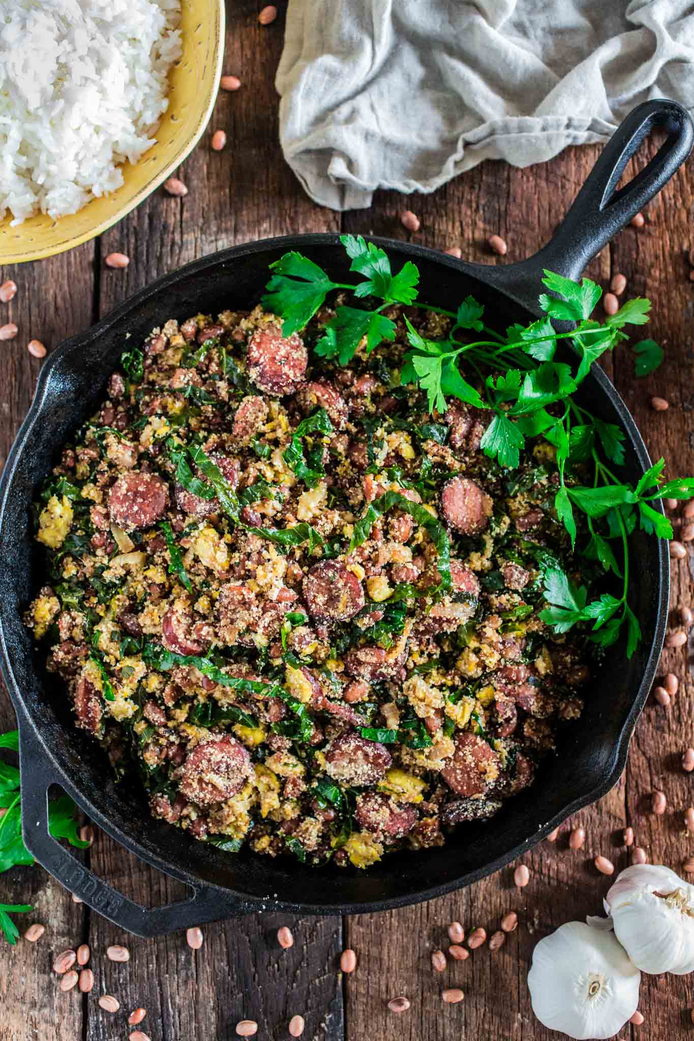 Feijão Tropeiro (Brazilian Beans with Sausage and Collard Greens) | www.oliviascuisine.com | If you like Brazilian food, this one is for you: Feijão Tropeiro. A traditional dish from Minas Gerais, made with beans, bacon, sausage, collard greens, eggs and manioc flour. 