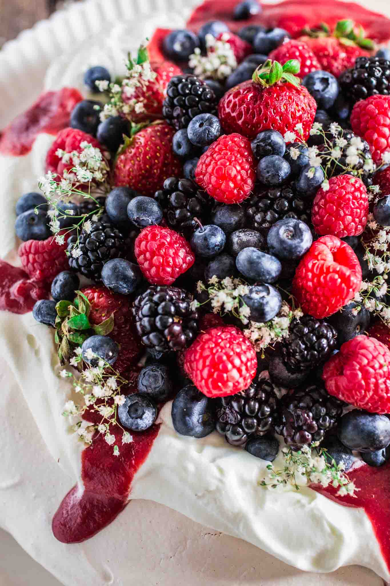 Berry Pavlova | www.oliviascuisine.com | A delicious meringue-based dessert named after the Russian ballerina Anna Pavlova. Easy to make and always a crowd pleaser!