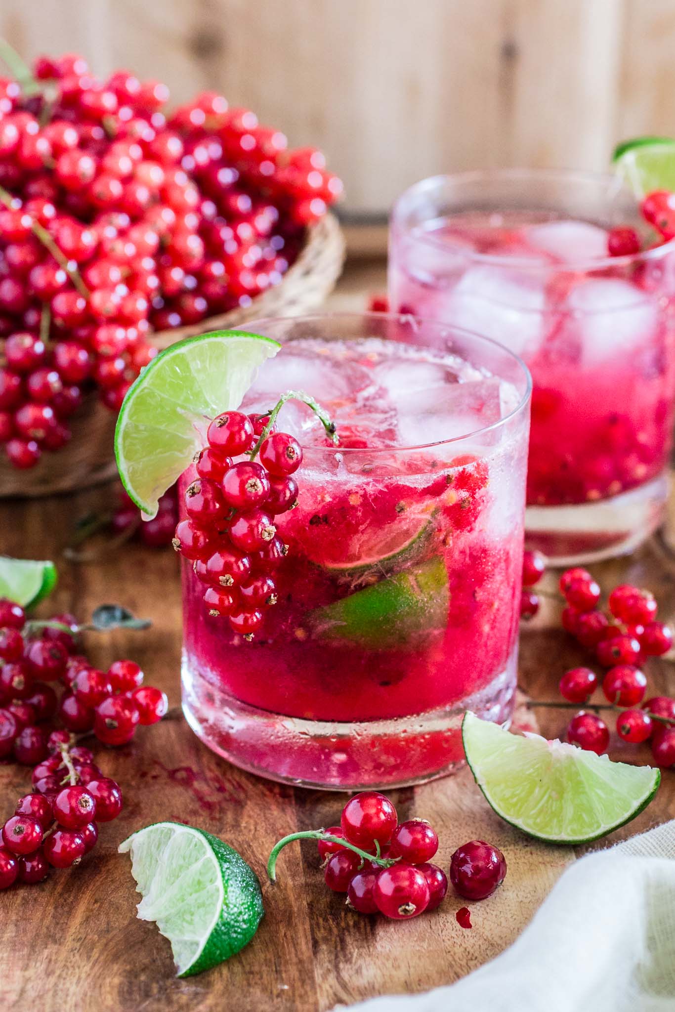 Red Currant Caipirinha | www.oliviascuisine.com | This red currant twist on a classic lime Caipirinha might be my new favorite summertime cocktail! Sour, sweet and as strong as you can take it. There's really no better way to beat the heat! (Sponsored by HBF International.)